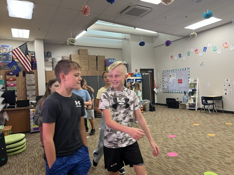 students walking and talking - Mrs. Schaecher 