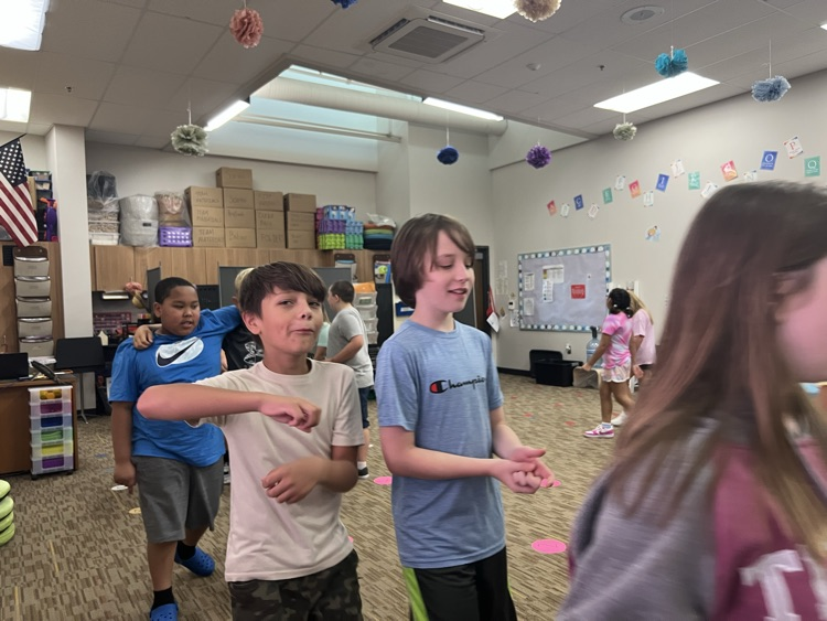 students walking and talking - Mrs. Schaecher 