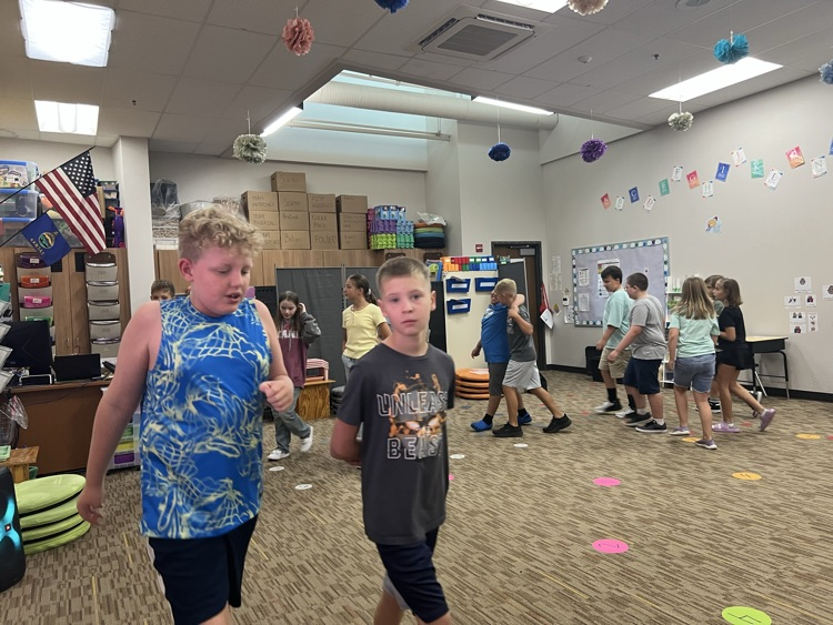 students walking and talking - Mrs. Schaecher 