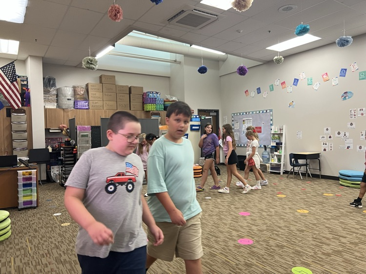 students walking and talking - Mrs. Schaecher 