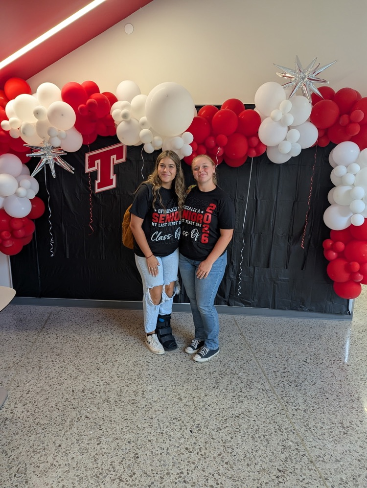 red and white balloon arches