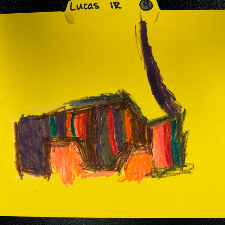 first graders drawing on folder