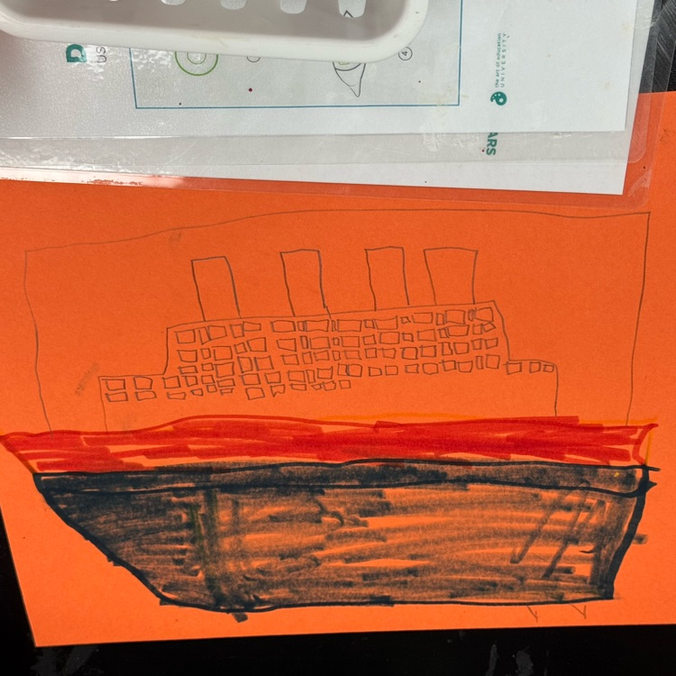first graders drawing on folder