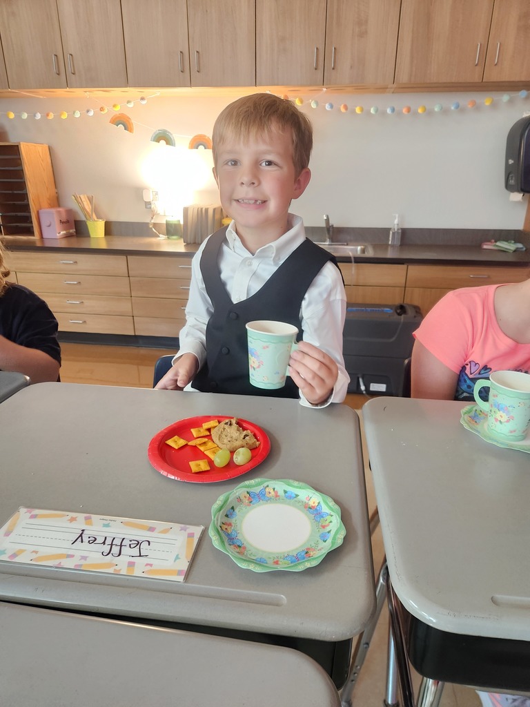Students enjoying tea party treats!