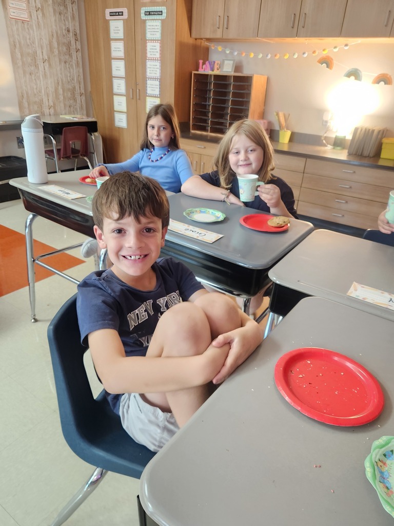 Students enjoying tea party treats!
