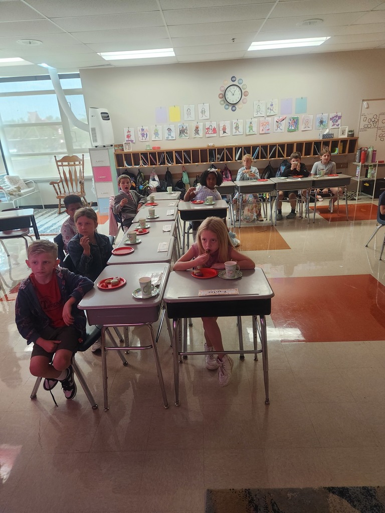Students enjoying tea party treats!