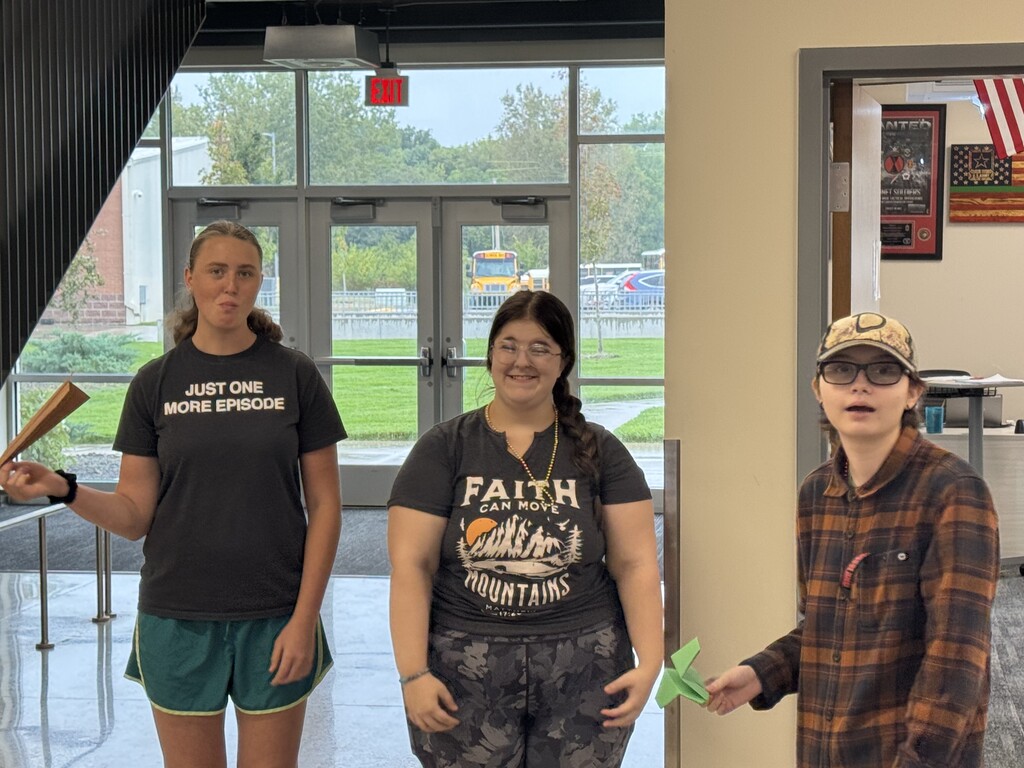 Testing out our production of paper airplanes.  Weather kept us inside today. 