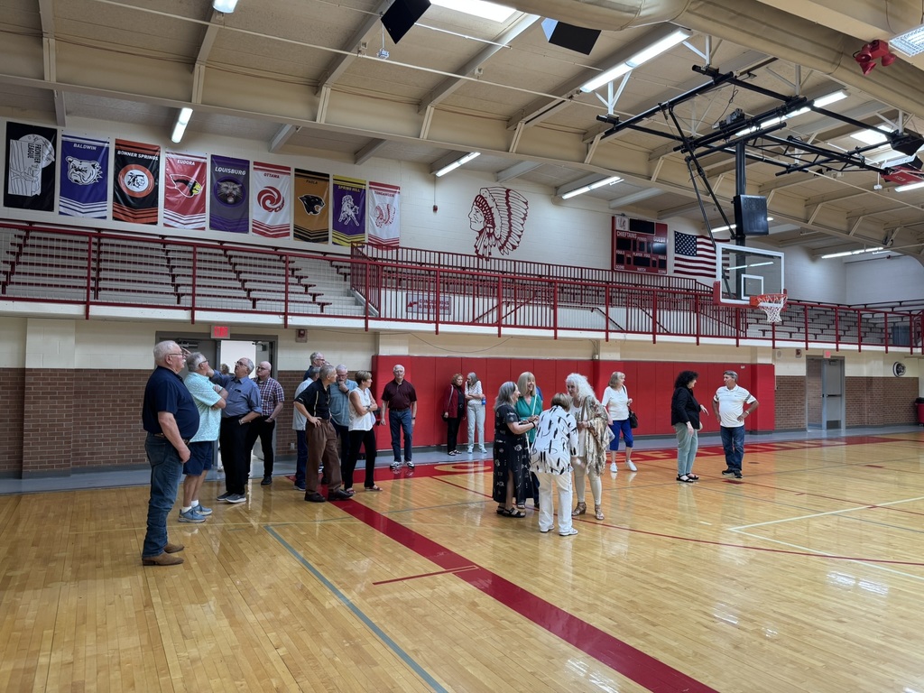 members gathered in the auxiliary gym