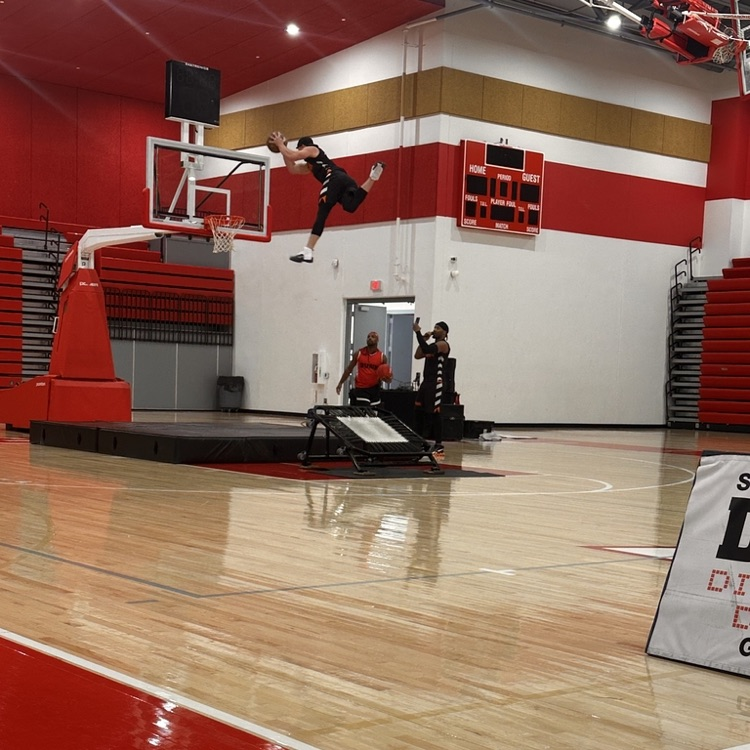 Dunking a basketball 