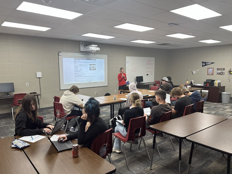 Mrs. Smith talking to Success Center students about career paths and post secondary training and education