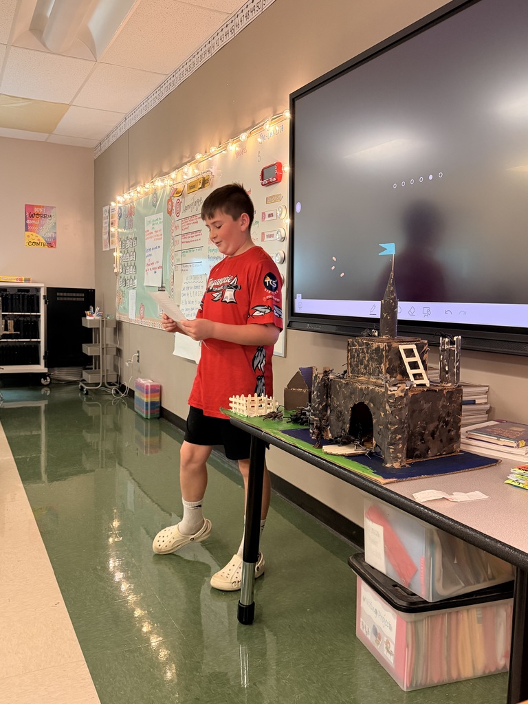 Wyatt Herman in Miss. Shea's 4th grade class with his medieval castle.