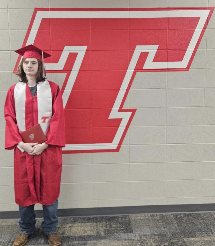 Max Wilson’s cap and gown photo