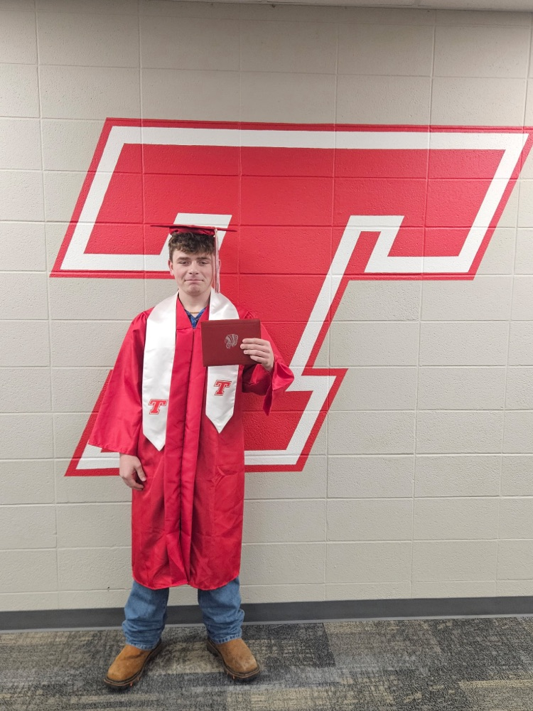 Dominic Shelert’s cap and gown photo