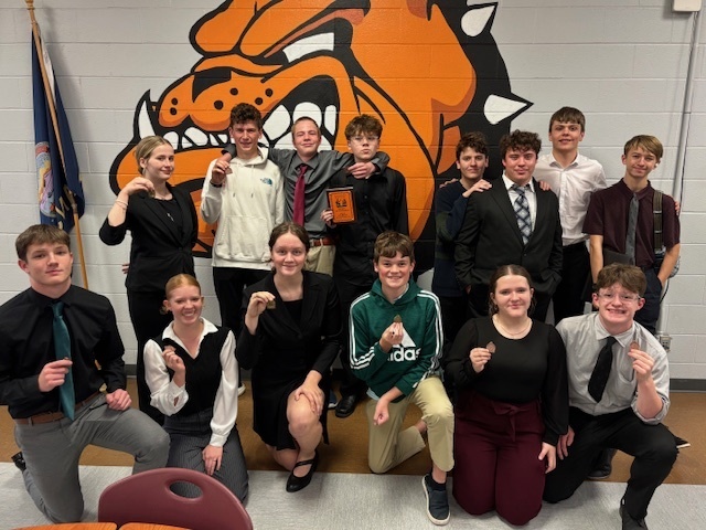 THS Debaters show their hardware from the Indy Invitational on 11/15.