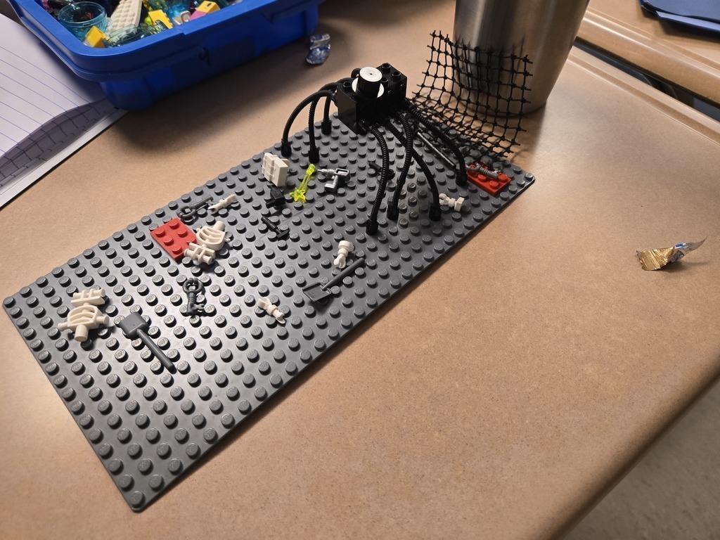 Lego haunted house with a giant black spider