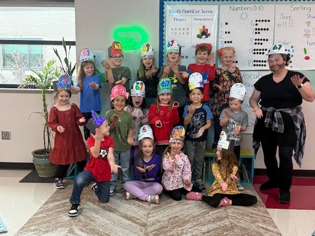 Mrs. DeKeyser's class doing the 6-7 hands sign