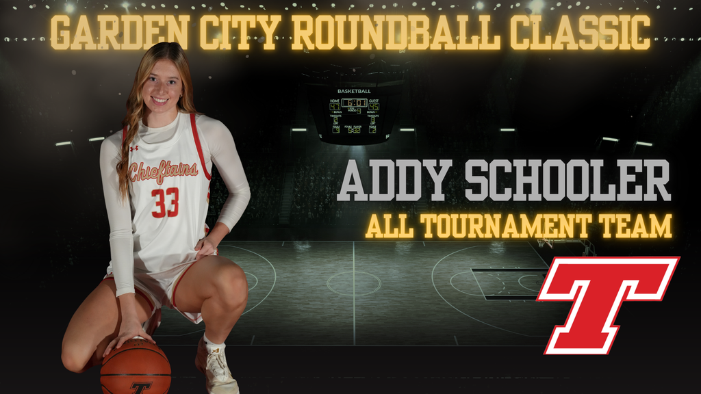 Teenage girl wearing white basketball uniform