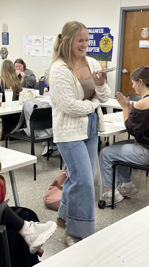 Kaysi Overdick on the phone with Dr. Watson.