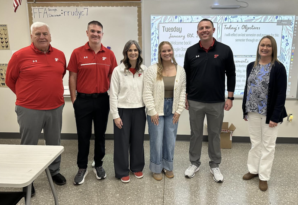 Kaysi with building and district adminstration.