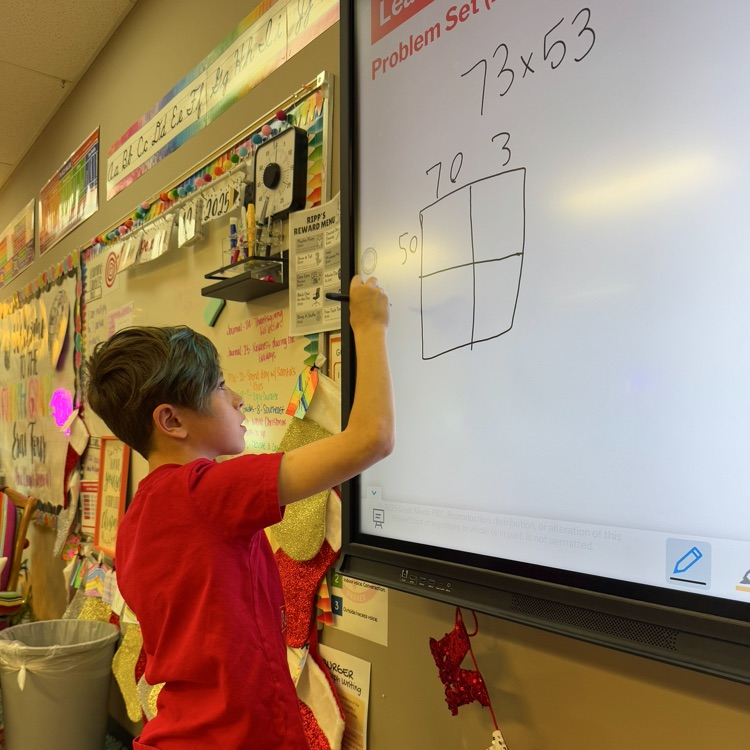 Mrs. Olsen’s students teaching each other. 