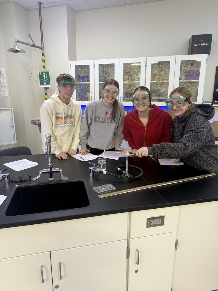 students doing a chemistry flame lab 
