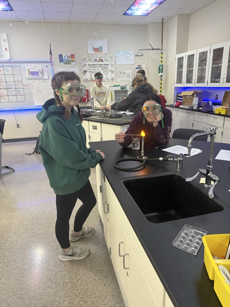 students doing a chemistry flame lab 