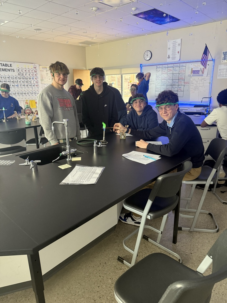 students doing a chemistry flame lab 