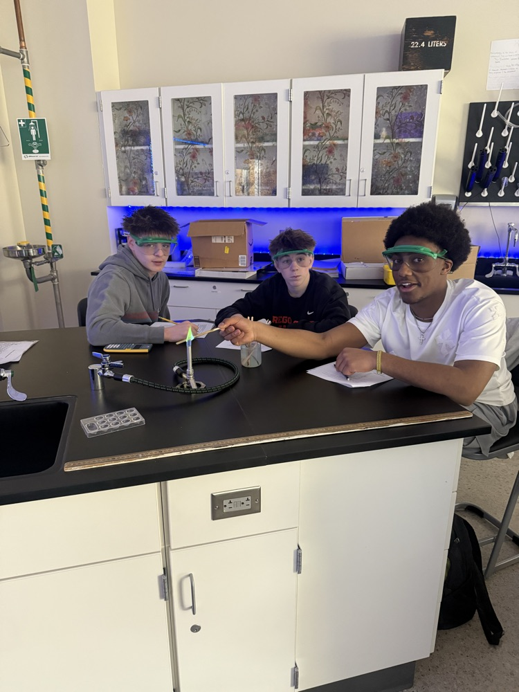 students doing a chemistry flame lab 