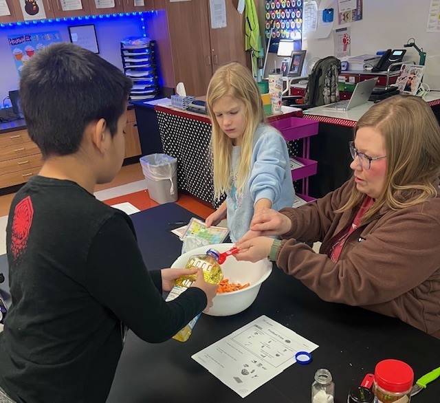 Mrs. Missy's class making football fries