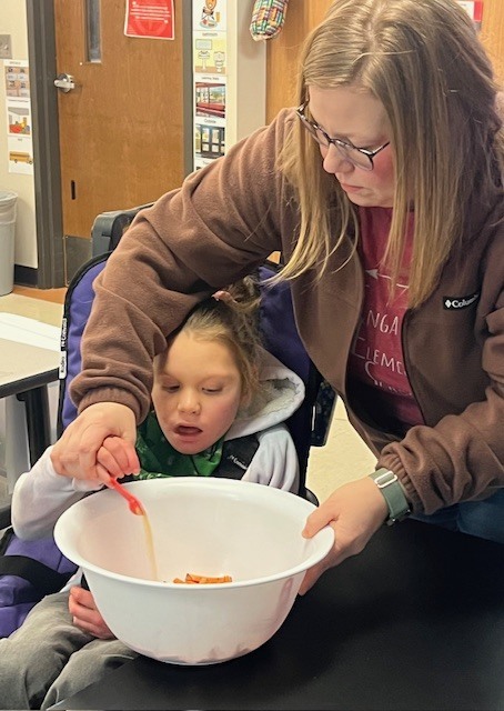 Mrs. Missy's class making football fries