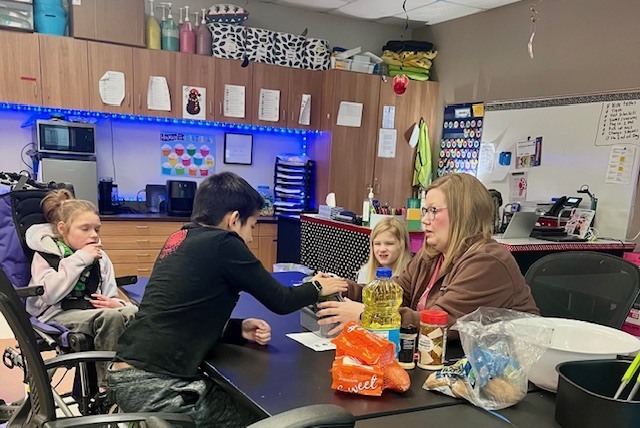 Mrs. Missy's class making football fries