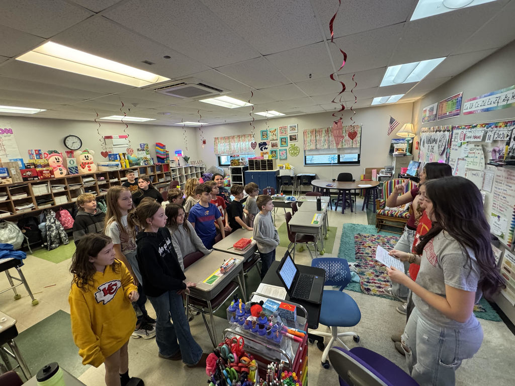 TMS FCCLA members visiting Mrs. Olsen's class