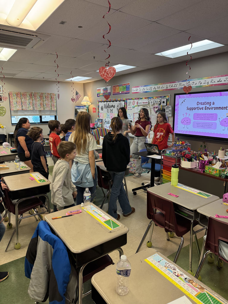 TMS FCCLA members visiting Mrs. Olsen's class