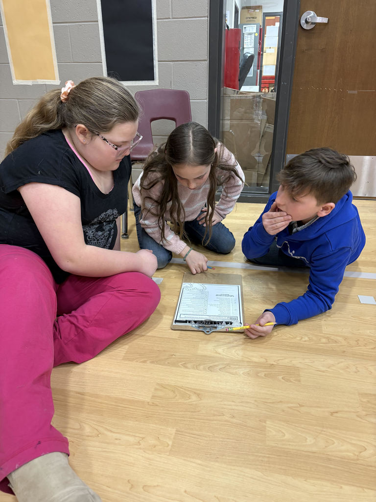 5th grade students reading escape room
