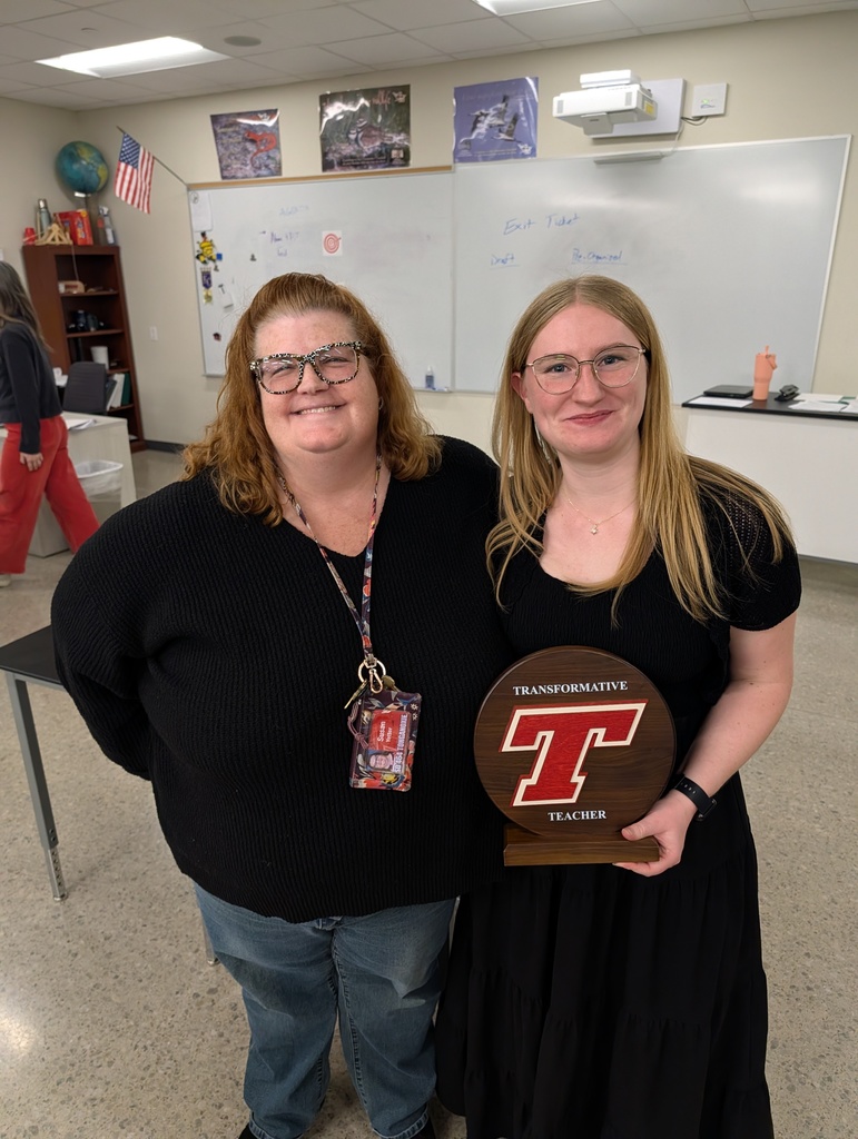 Ms. Monroe receiving the award.