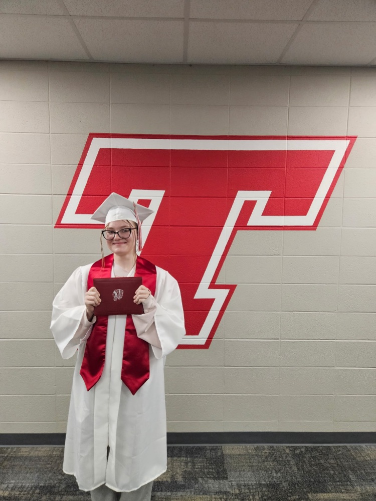Rei Hartford’s cap and gown photo