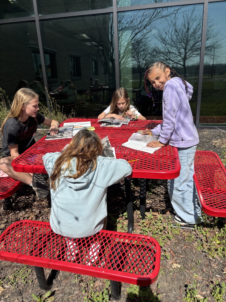 Mrs. Willis’ class enjoying the warm weather during their reading time.