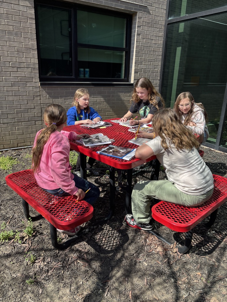 Mrs. Willis’ class enjoying the warm weather during their reading time.