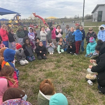Kindergarteners witnessing the Pumpkin Jack experiment being "burped".