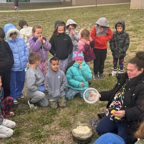 Kindergarteners witnessing the Pumpkin Jack experiment being "burped".