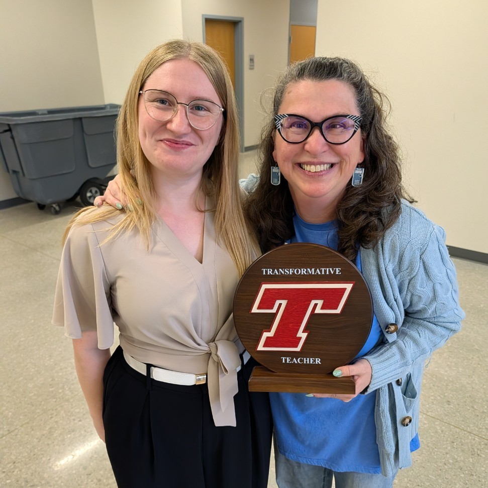 Julie Coffey receiving the award.