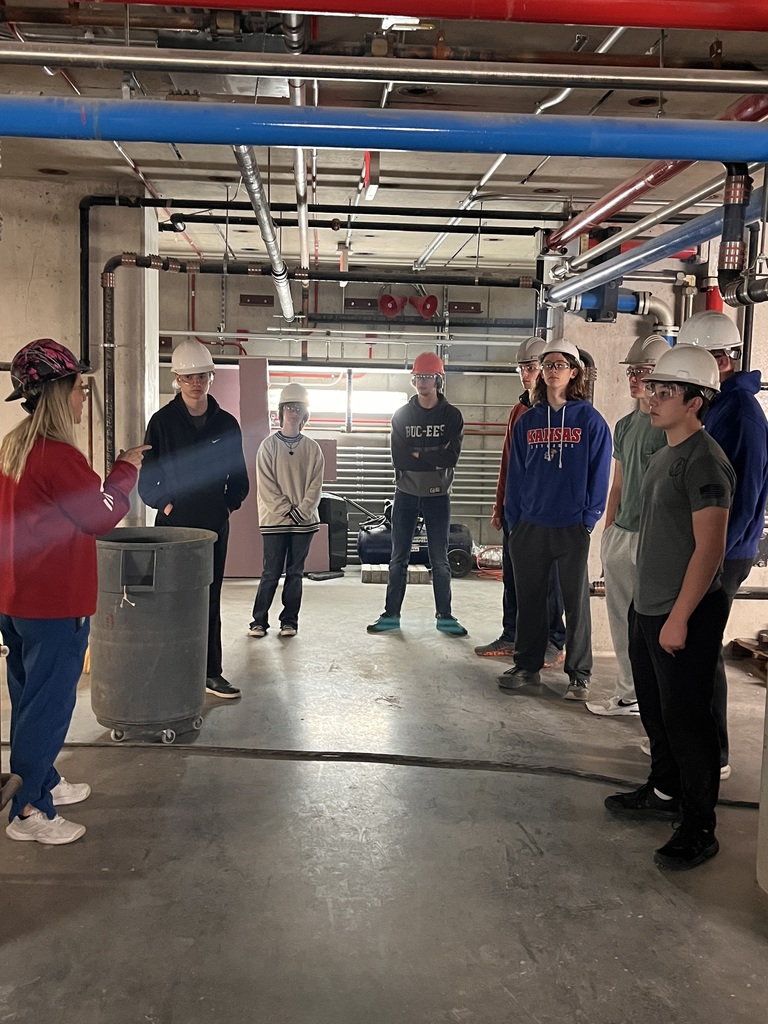 Engineering students at the structural testing facility.