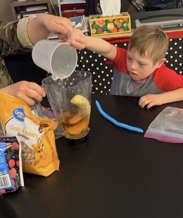 Mrs. Missy's class making berry smoothie bowls