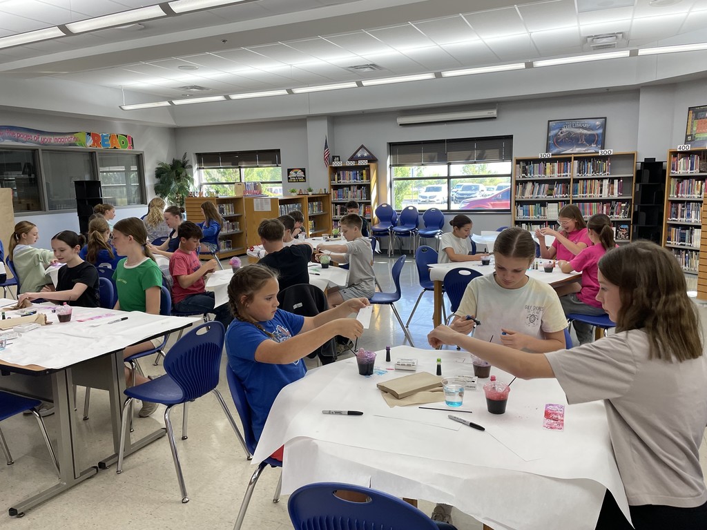 Students enjoyed making colorful bookmarks with bubbles and food coloring! 