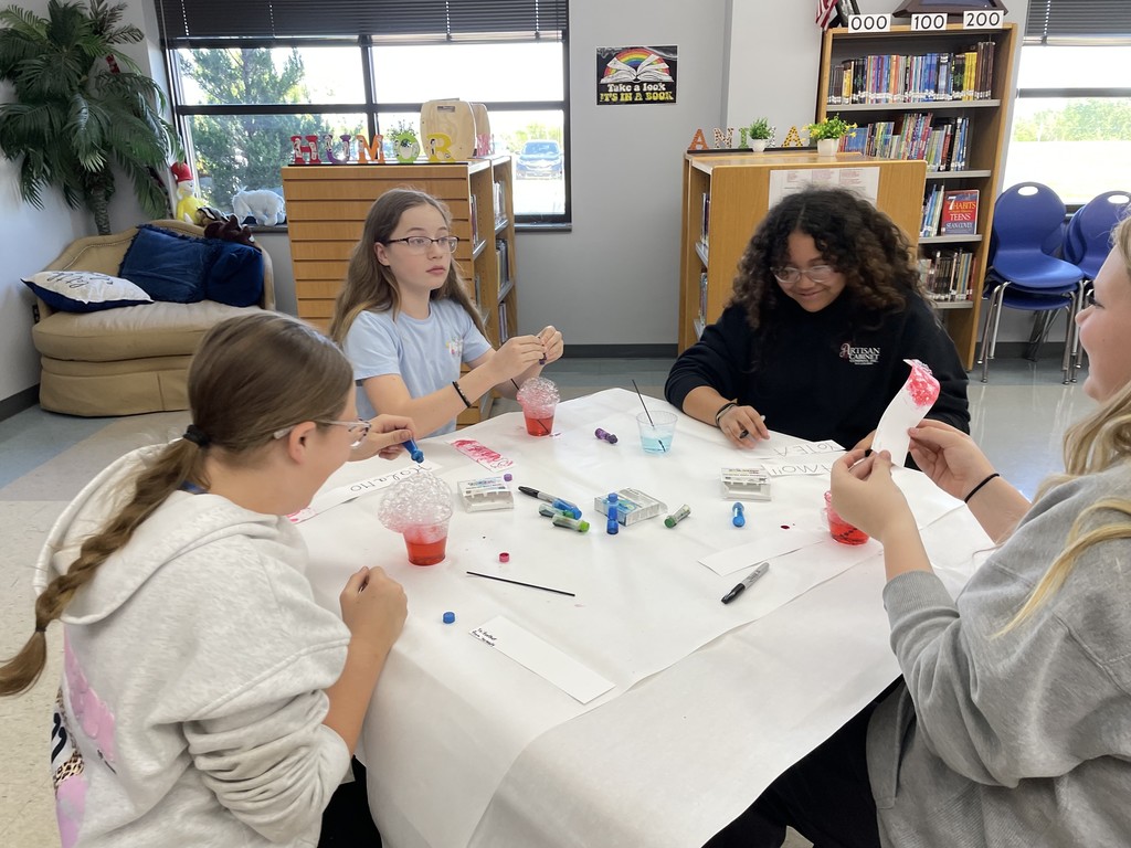 Students enjoyed making colorful bookmarks with bubbles and food coloring! 