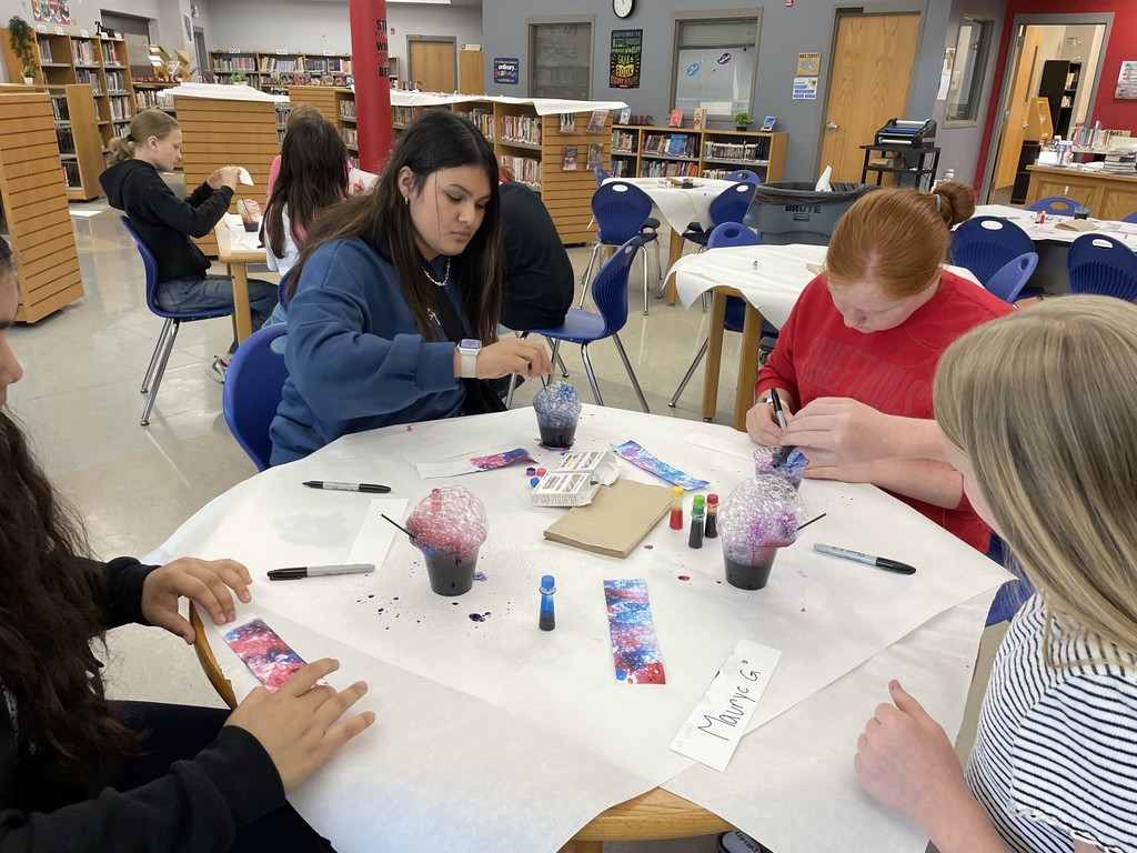 Students enjoyed making colorful bookmarks with bubbles and food coloring! 