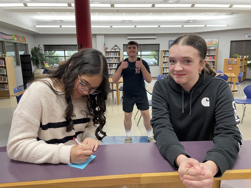 Not to be outdone, our other Principal for the Day, Isra, handled some “serious” business—signing a blue card for Sophia 👀