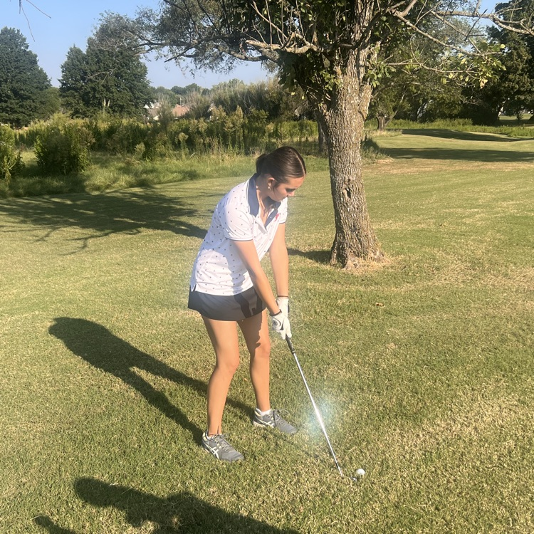 Solara hitting a wedge