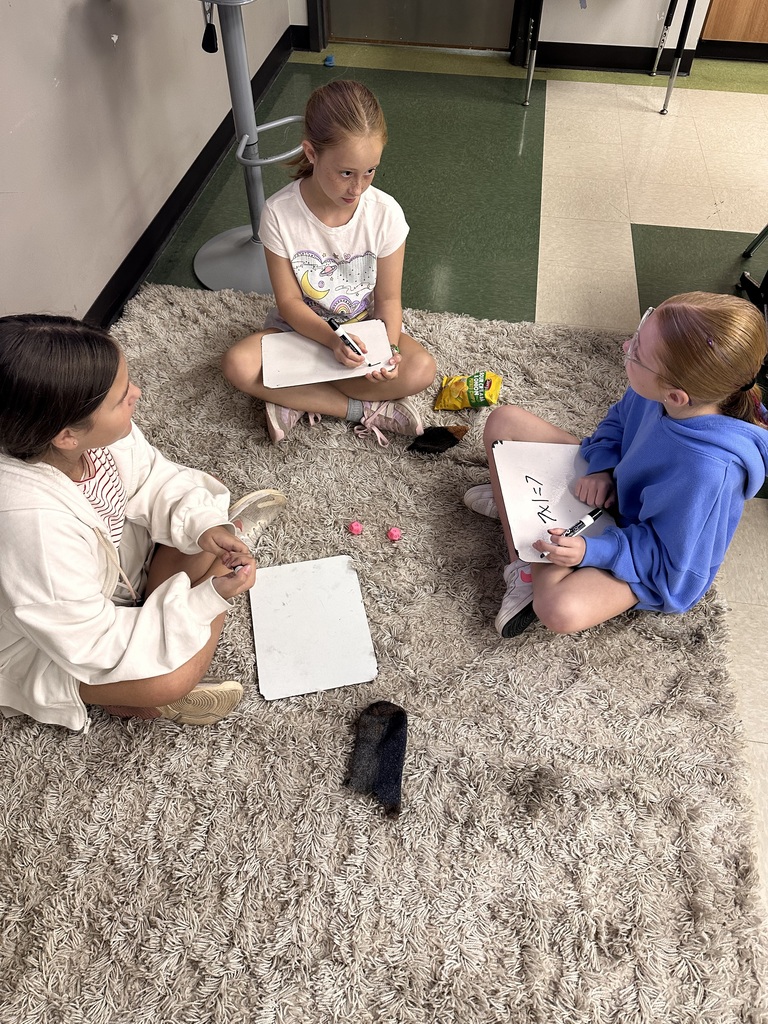 Students are practicing their multiplication math facts with a hands on dice activity.