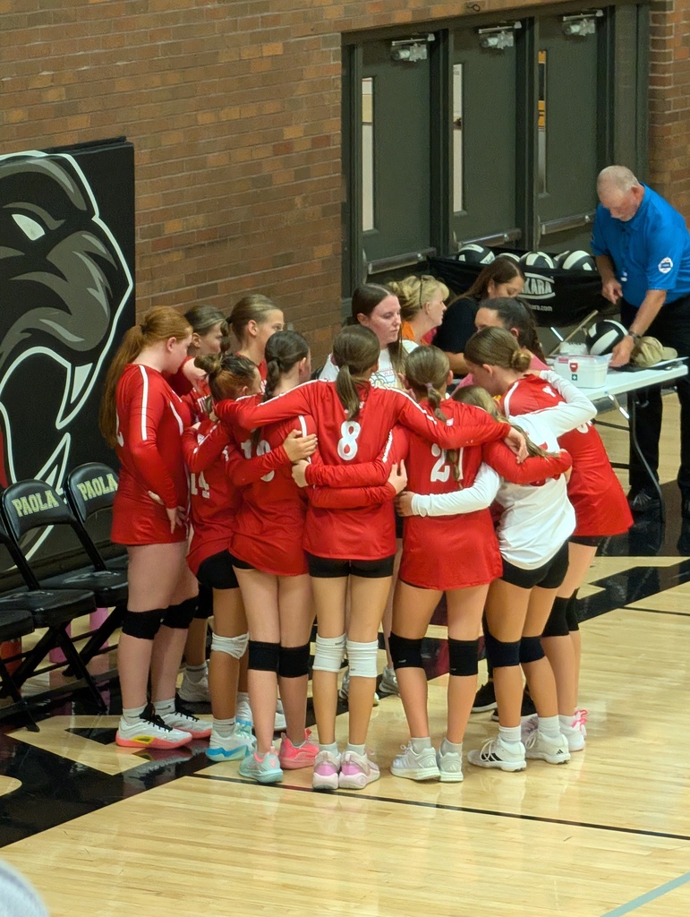 7th grade JV in a huddle